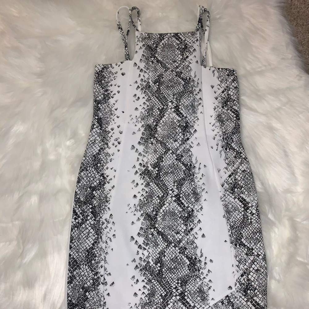 Tight snakeskin dress
